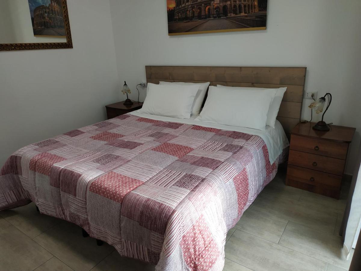 Bed and Breakfast Un Passo Dal Mare Fiumicino Exterior foto A bedroom