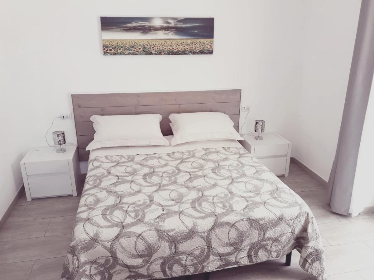 Bed and Breakfast Un Passo Dal Mare Fiumicino Exterior foto A bedroom